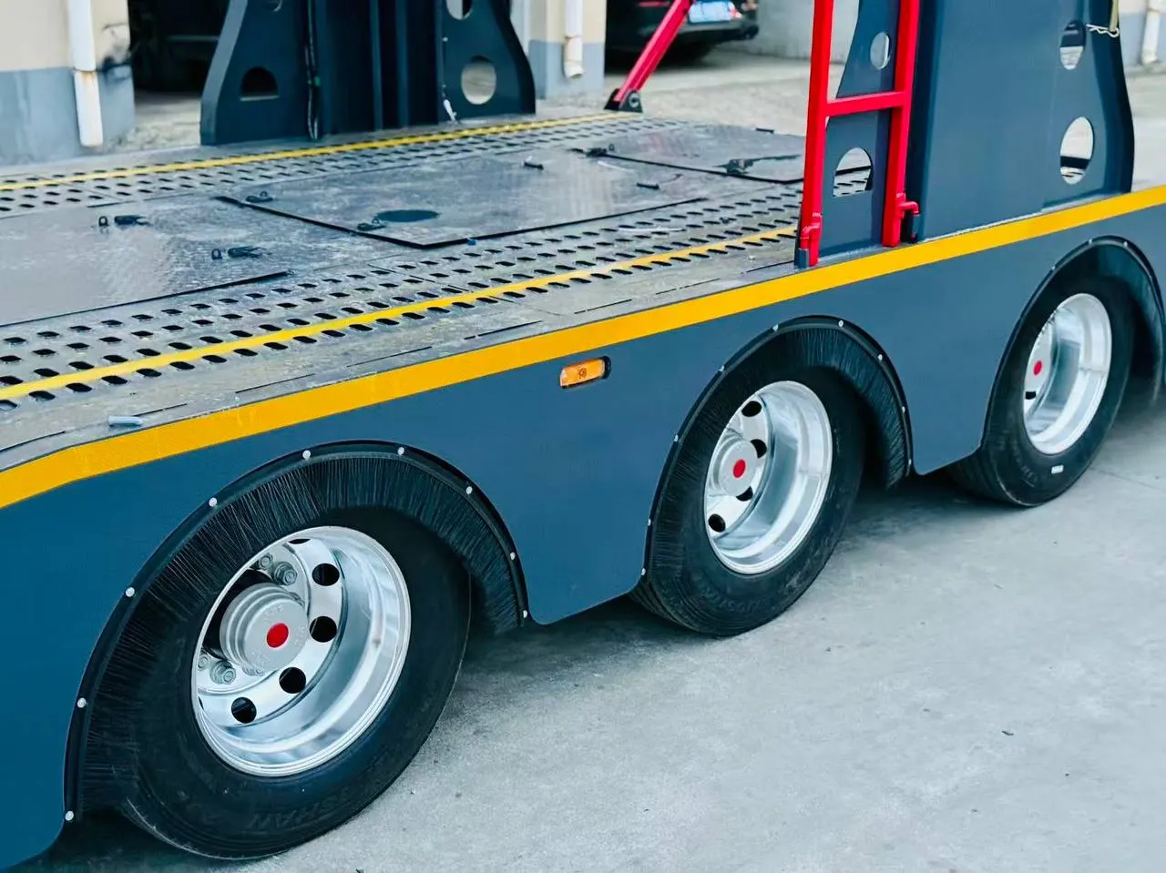 Trailer axles and suspension assemblies